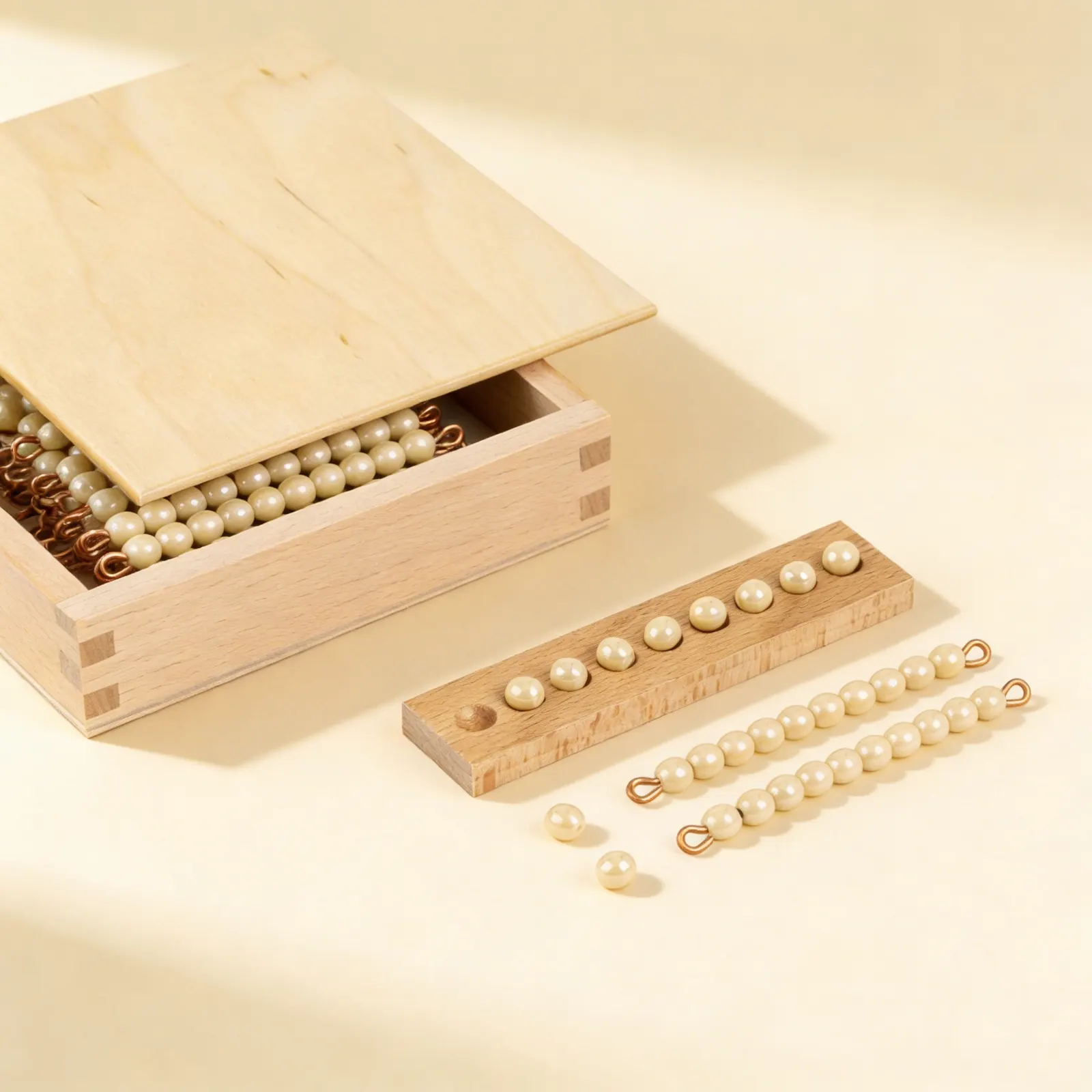 Tens Bead Box: Glass Bead Bars for Decimal System Introduction: Side view