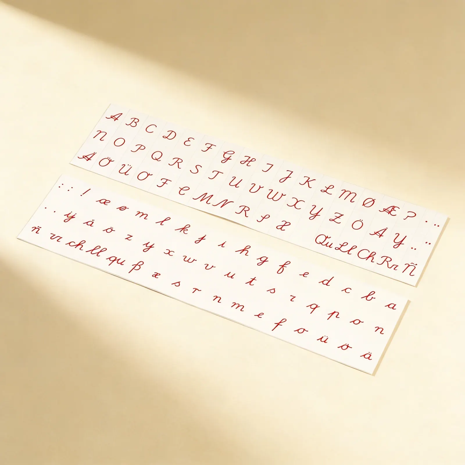 Printed Alphabet: International Cursive - Red: Side view
