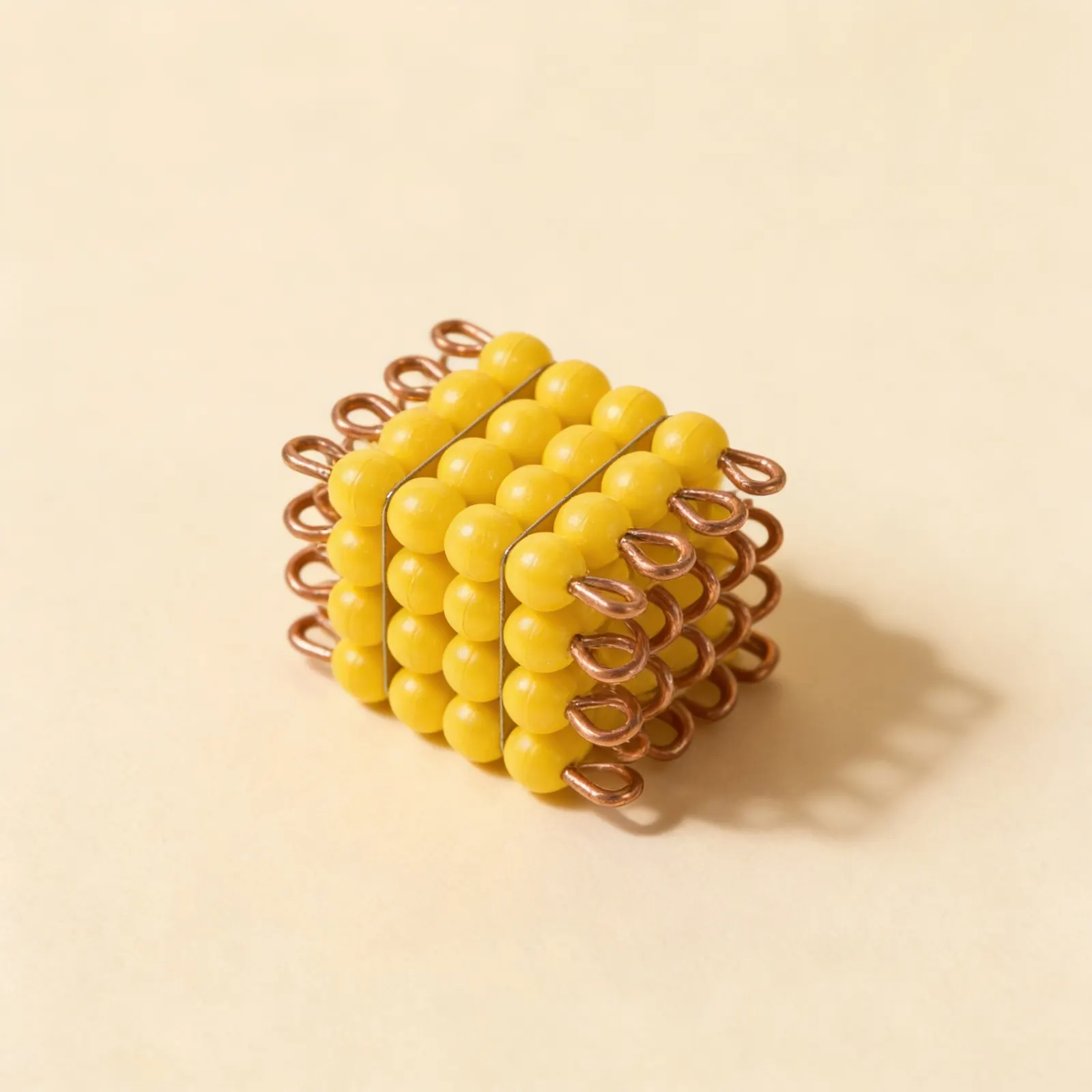 Nylon Bead Cube of 4: Yellow Wire-Threaded Sensorial Mathematics: Side view