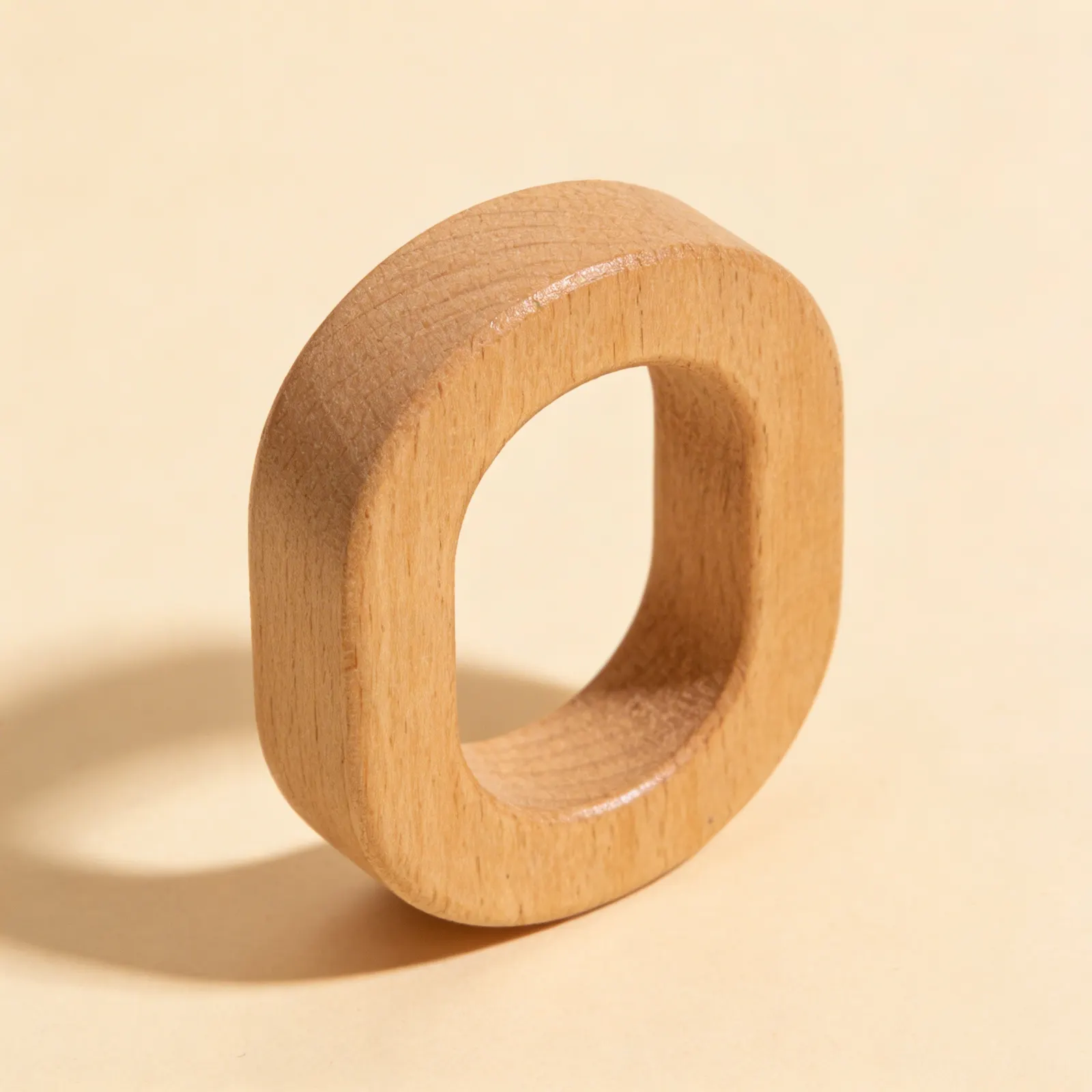 Wooden Oval Grasping Ring: Natural Sensory Hand Coordination Tool: Side view
