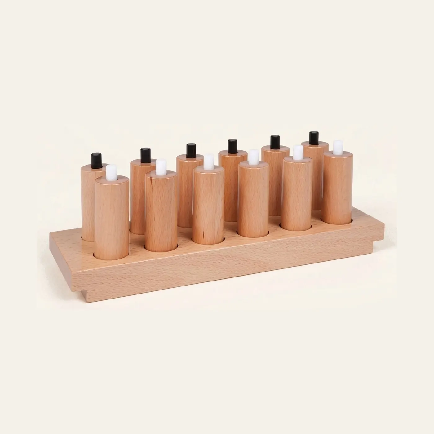 Pressure Cylinders: Spring-Loaded Pairs for Weight Discrimination: Montessori material | Faborino