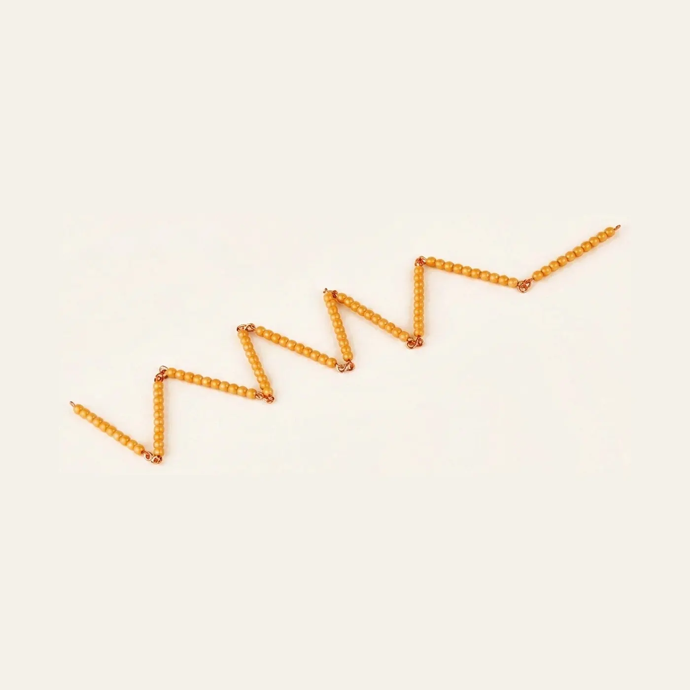 Golden Bead Chain Of 100: Individual Beads Nylon (Nienhuis): Montessori material | Faborino