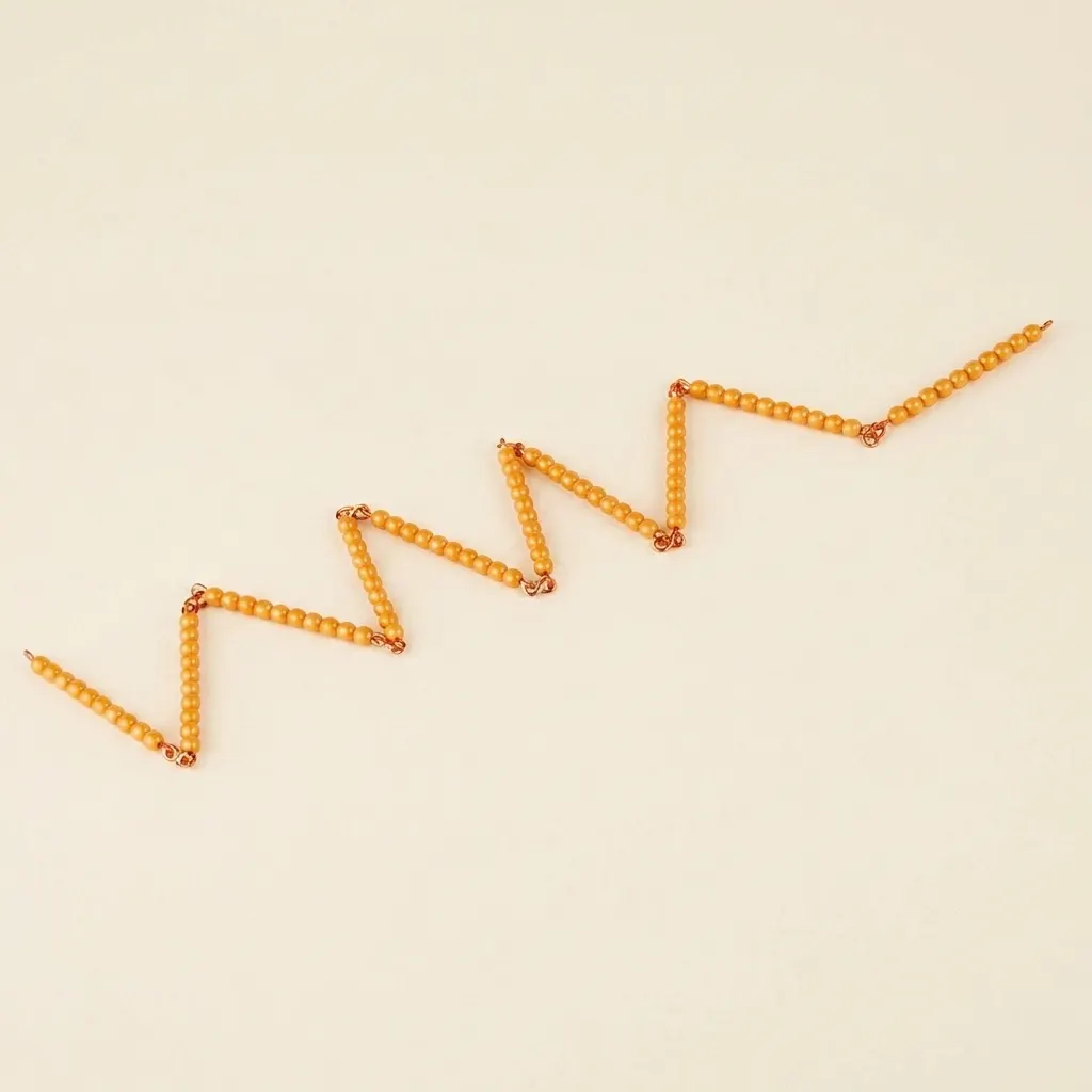 Zlatý korálkový řetěz 100: Jednotlivé korálky nylon - Montessori Material | Faborino