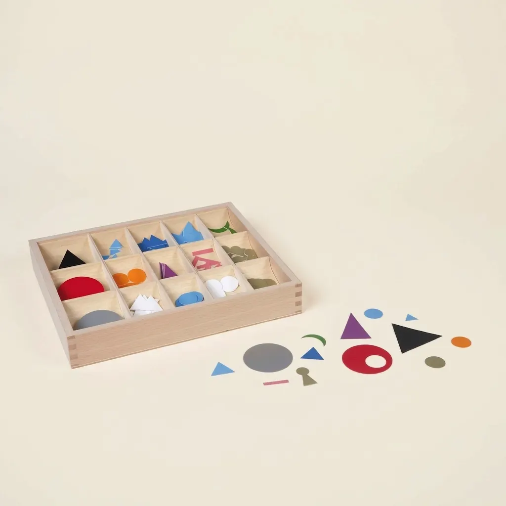 Gramatické symboly: plastové barevné slovní druhy v krabičce - Montessori Material | Faborino